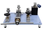 HS721 pneumatic comparator bench setup with dual gauge calibration ports